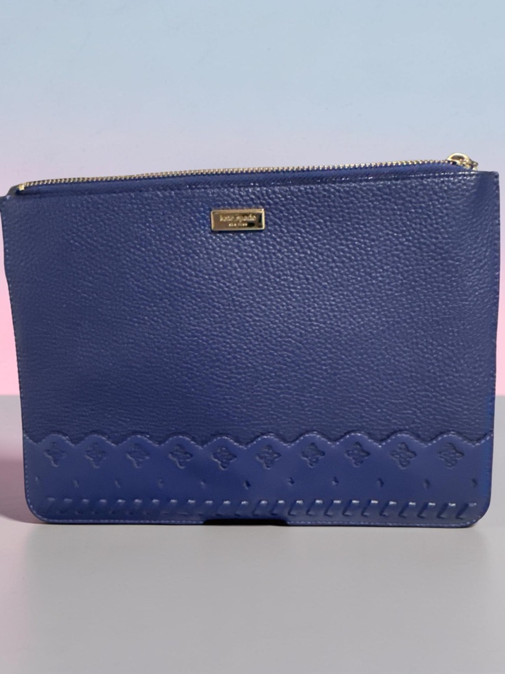 kate spade pebbled leather clutch in deep navy with scallop detail